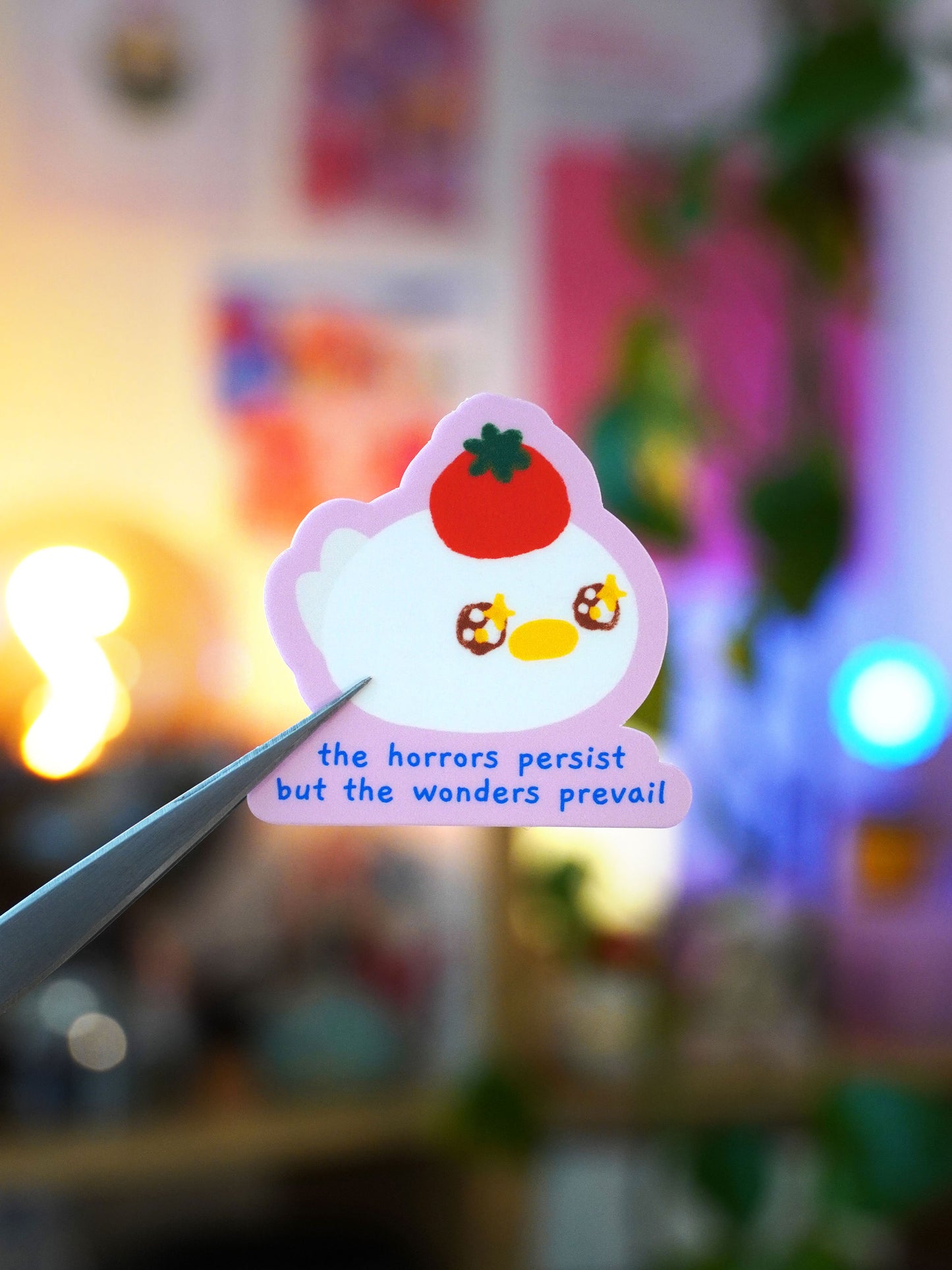the horrors persist, but the wonders prevail 🍅 sticker