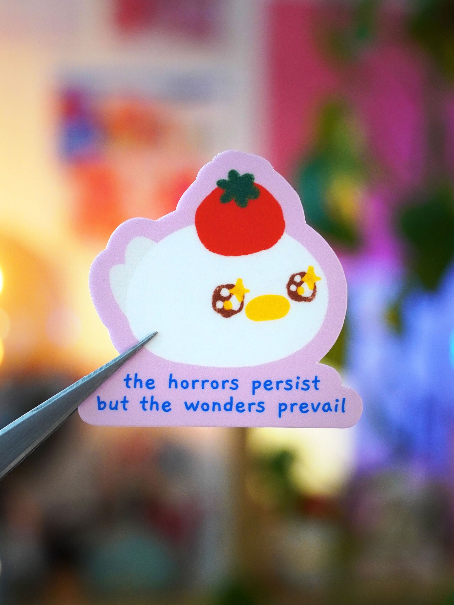 the horrors persist, but the wonders prevail 🍅 sticker